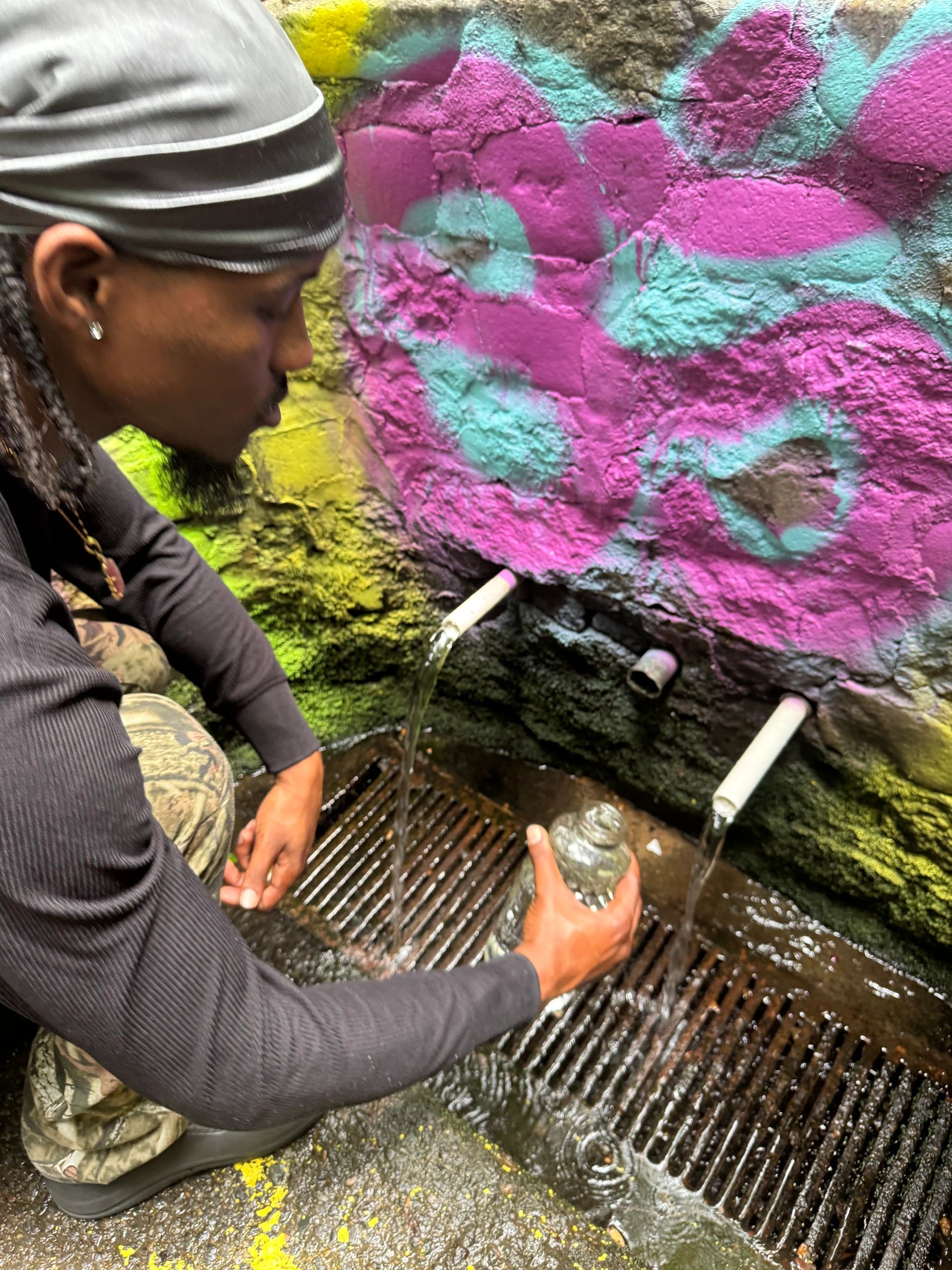 Young Pharaoh, Khi, collecting water from the natural spring 