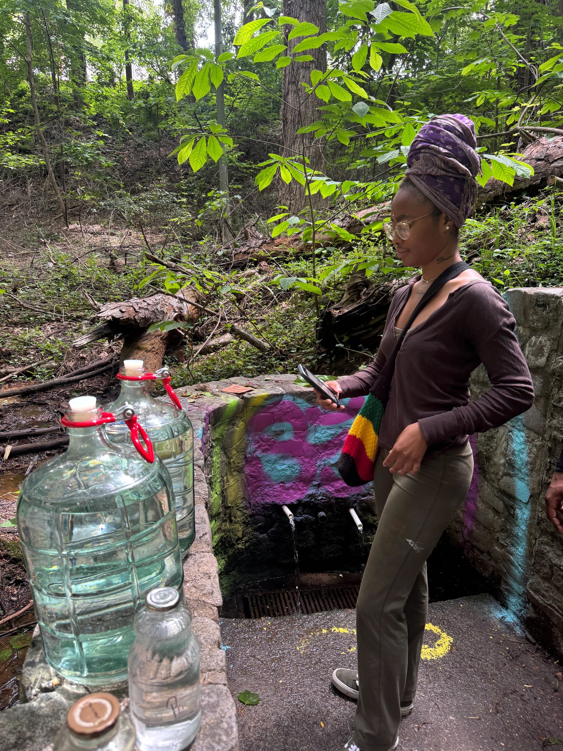 Young Pharaoh, Kiersten, allowing the spring water to absorb energy from The Sun